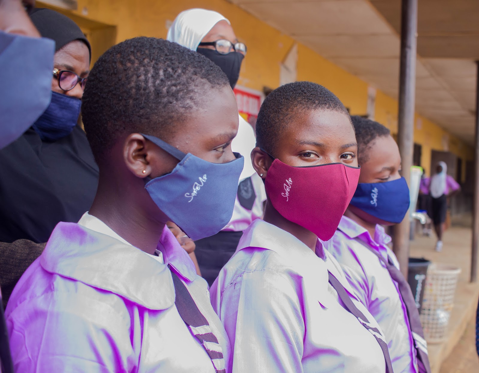 Schoolgirls wearing masks during the morning session